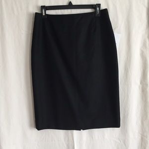 NWOT black wool Hermès skirt. Sz 8 (40 Fr)